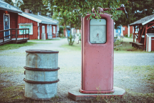 Old-fashioned Swedish petrol pump at a gas station in a village, Gammelstaden, Lulea, Norrbotten, Sweden