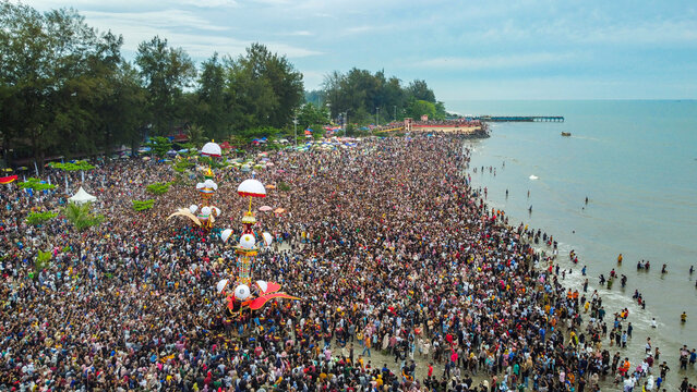 Aerial view of crowds at the annual Tabuik Pariaman cultural festival on the beach, West Sumatra, Indonesia