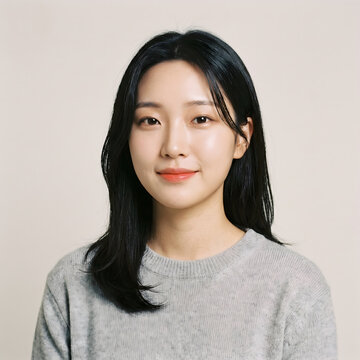 ast asian woman grey sweater headshot