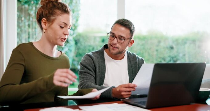 Happy, finance and couple with paperwork, laptop and budget planning for mortgage in home. Marriage, talking and man with woman with documents for financial report, audit and tax for online banking