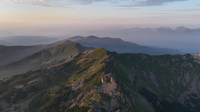 Aerial view of mountain ridges of the Apennines during golden hour in Cerreto Laghi, Emilia-Romagna, Italy.