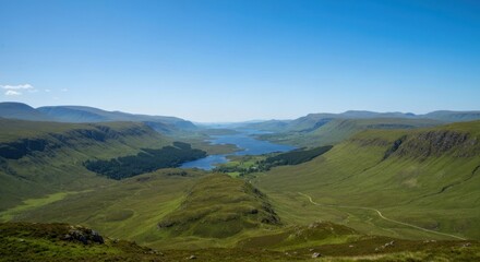 Sweeping valley view with lake under a clear blue sky, grassy hills © Darminah