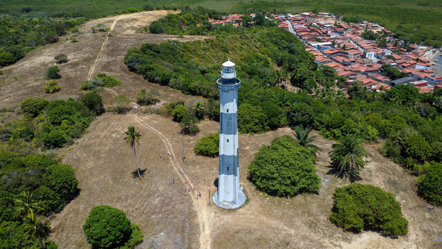 Aerial Perspective: The Iconic Lighthouse of Porto de Pedras