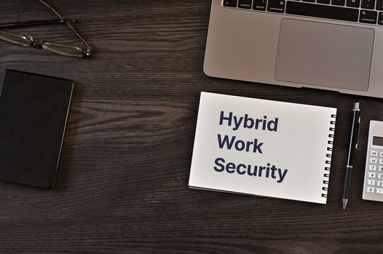 Hybrid Work Security Documentation on Workspace Desk &mdash; ideal for IT security and remote work articles