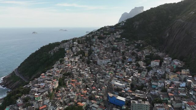 Aerial view of the Vidigal favela nestled on a steep hillside overlooking the Atlantic Ocean in Rio de Janeiro, Rio de Janeiro, Brazil.