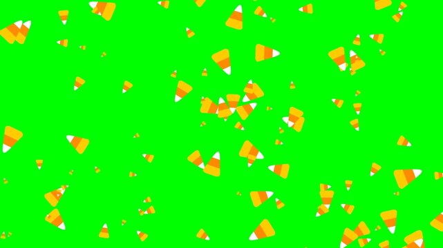 Falling candy corn rain animation seamless loop on green screen chroma key background in 4K