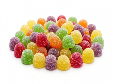 Sugary gumdrops in vibrant assorted colors piled on white background for confectionery marketing and food packaging design