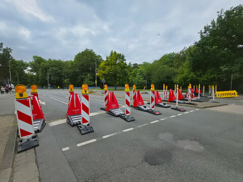 Hanover, Germany - 23 July 2026: View of traffic barriers and safety cones set up on a road near Maschsee in preparation for the Maschseefest and Die Finals 2026 events.
