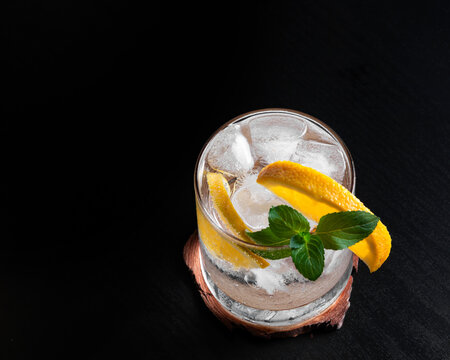 Top View of Refreshing Citrus Cocktail With Orange Slices Mint and Ice