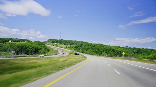Driving through the beautiful summer landscapes of Nova Scotia, Canada