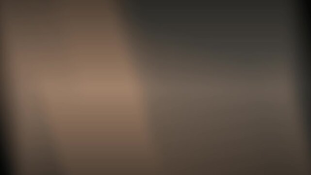 Abstract blurred gradient background animation with mocca and gray colors, soft glow, and dark vignette. Modern mocca and gray gradient background animation