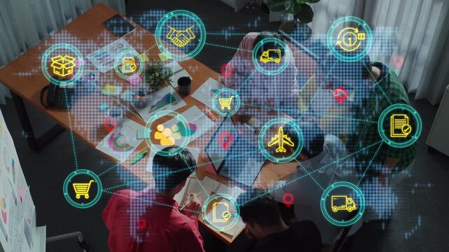 Diverse group of professionals collaborating on logistics and supply chain strategy with digital technology graphics overlay in modern workspace. Entropy.