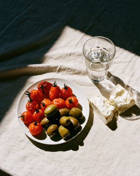 Mediterranean Food Editorial with Goat Cheese, Tomatoes and Olives