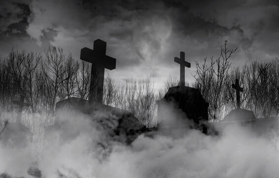 Halloween day concept. Cemetery or graveyard in the night with dark sky. Haunted cemetery. Spooky and creepy burial ground. Horror scene of graveyard. Funeral concept. Halloween day background.