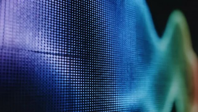 Macro view of digital LED screen pixel grid pattern.