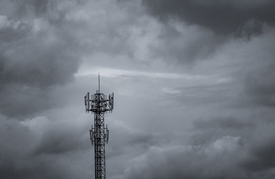 Cellular communication tower with storm clouds. Telecommunications infrastructure, wireless networks, mobile connectivity, digital communication and modern technology. Mobile network infrastructure.