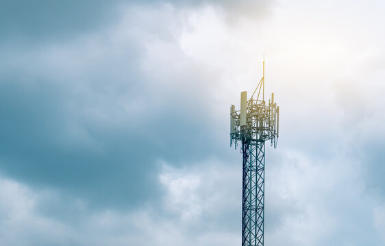 Telecommunication tower with dramatic cloudy sky. 5G mobile network, wireless communication infrastructure, digital connectivity and future technology. Telecom infrastructure, internet connectivity.