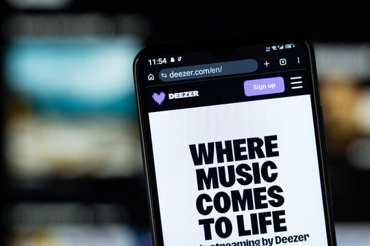 Paris, France - 02 August 2026: Close-up of Deezer homepage on a smartphone.