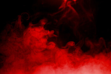 Fototapeta premium Realistic red smoke isolated on black background, featuring swirling vapor for overlays, photo compositing, cinematic visual effects, motion graphics, abstract backgrounds and design.