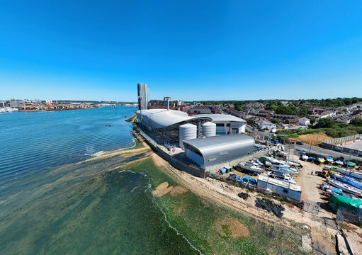 Aerial view of the Woolston Water Treatment Plant featuring modern industrial architecture and storage tanks situated along the River Itchen in Southampton, England, United Kingdom.