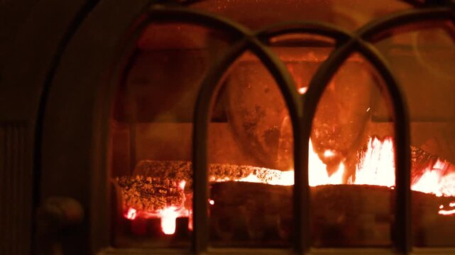 Burning Logs in a Traditional Cast Iron Wood Stove
