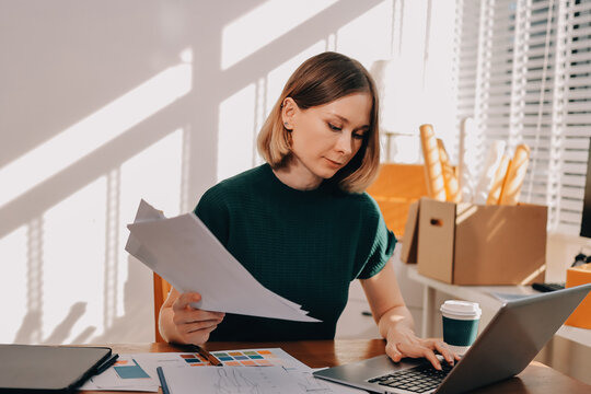 Logistics, small business woman with checklist for stock, clothes order or retail inventory management. Shipping, writing or person at ecommerce startup store for sme delivery with fashion designer