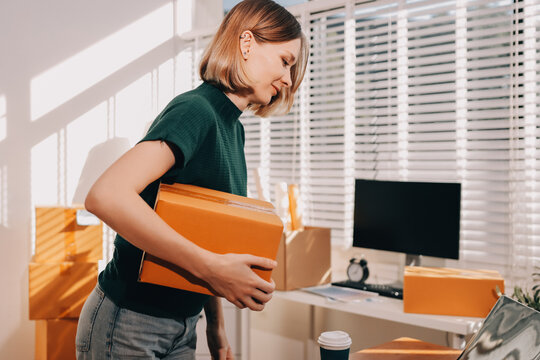 Logistics, small business woman with checklist for stock, clothes order or retail inventory management. Shipping, writing or person at ecommerce startup store for sme delivery with fashion designer
