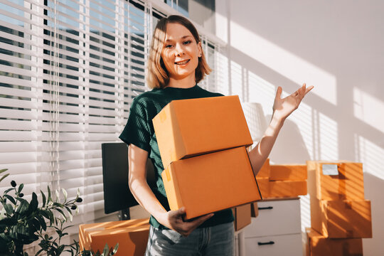Logistics, small business woman with checklist for stock, clothes order or retail inventory management. Shipping, writing or person at ecommerce startup store for sme delivery with fashion designer