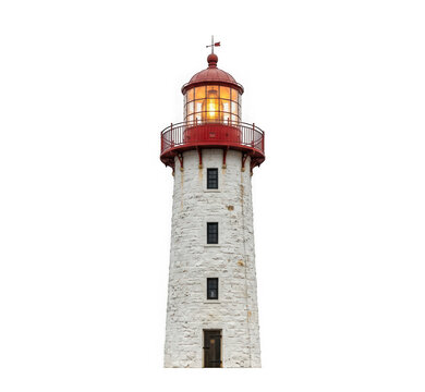Historic stone lighthouse with a red lantern room and glowing light isolated on transparent background