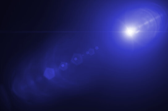 Cinematic optical lens flare with hexagonal aperture glints and anamorphic streak