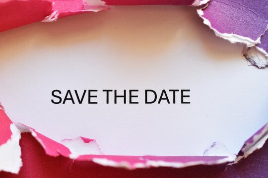 save the date write on multicolored torn paper - banner 