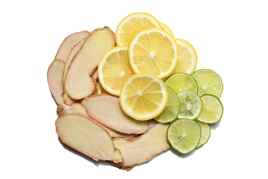 Fresh slices of lemon, lime, and ginger root.