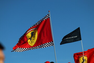 Obraz premium 22 May 2026, Montreal, Canada: Ferrari flags wave above Formula 1 fans at Grand Prix weekend. g.