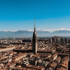 Obraz premium Captivating European cityscape, a majestic spired historic architecture landmark dominating the skyline, set against a backdrop of distant snow-capped mountains under a vibrant blue sky