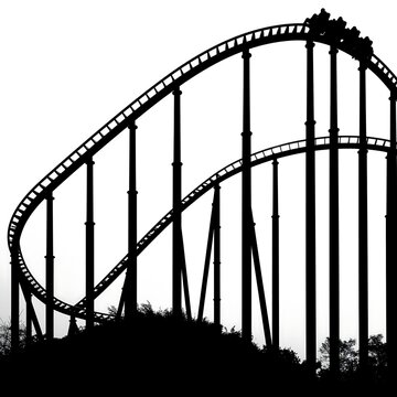 Black and white roller coaster structure against dark sky.
