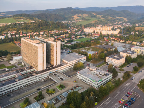 Aerial view of the F. D. Roosevelt University Hospital complex featuring large medical buildings, parking areas, and surrounding greenery in Banska Bystrica, Banskobystricky kraj, Slovakia.