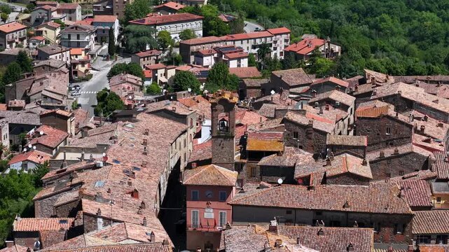 High angle cinematic view of the medieval hilltop village of Ficulle in the Terni province