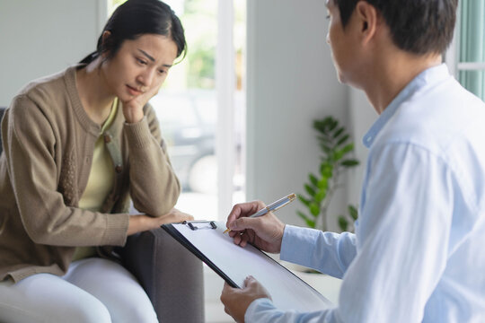 psychologist doctor counselor talk to patient in mental illness therapy
