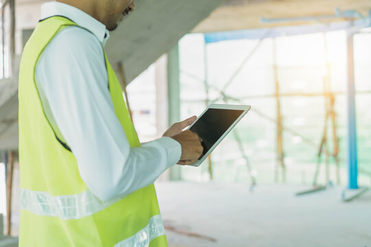 Builder inspection consultancy. Inspector checking material and structure in construction.