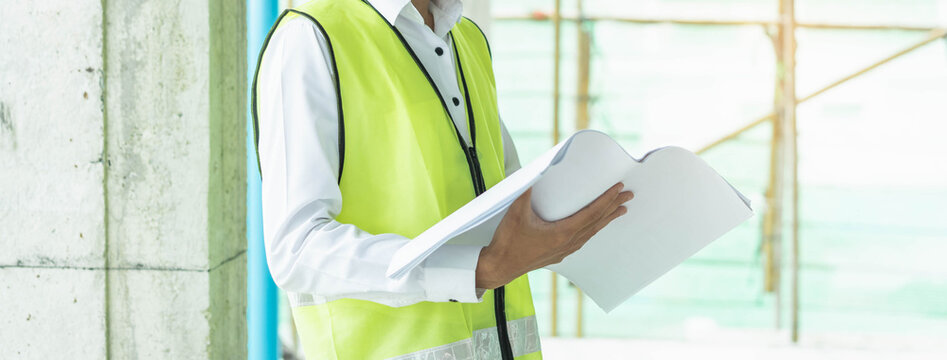 Builder inspection consultancy. Inspector checking material and structure in construction.