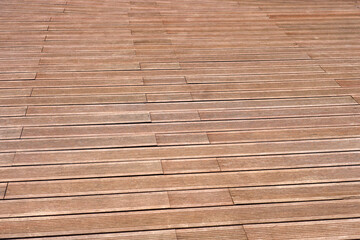 Obraz premium Dark brown composite wooden deck flooring planks.