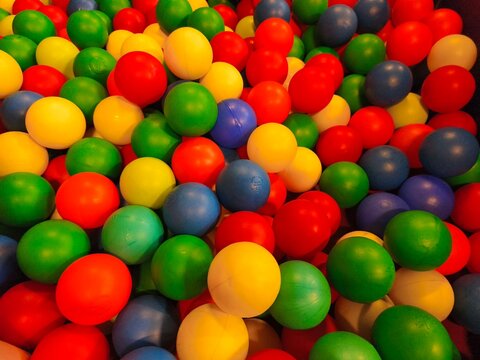 Full frame background of colorful plastic balls in children ball pit pool