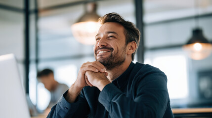 Fototapeta premium Businessman smile office laptop portrait work thoughtful businessman smiling while working 