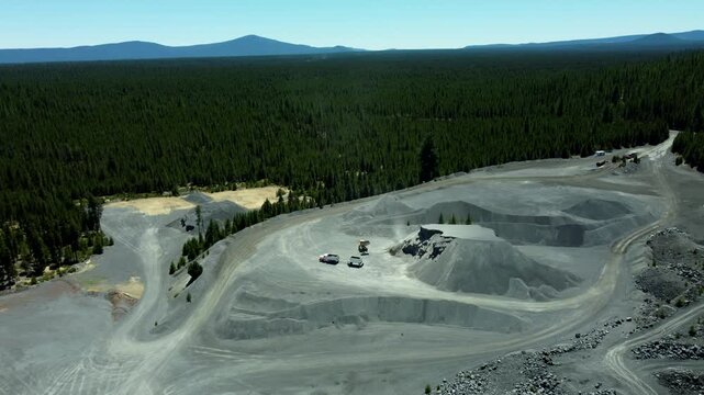 US, Oregon, Crescent, 2026-07-09 - Drone view of a volcanic rock quarry at Black Rock Butte, a lava cinder cone, in Summer