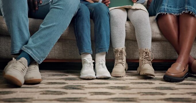 Family, legs or relaxing on sofa in home for comfort, holiday break or bonding together. Waiting, row or parents with kids, shoes or floor on living room couch for weekend, rest or free time in house