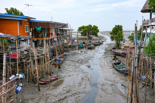 The surrounding living conditions of a small fishing village by the sea in Bang Pu District, Samut Prakan Province, Thailand, photographed on July 30, 2026.