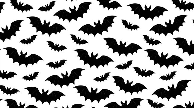 Seamless repeating pattern of black flying bat silhouettes on plain white background perfect for halloween festive decoration and textile design projects