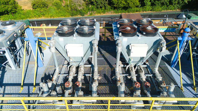 Aerial view of data center HVAC thermal management and cooling fans installed on a rooftop platform in Andover, England, United Kingdom.
