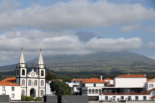 View of the Church of Saint Mary Magdalene on Pico Island, Azores, Portugal- Mount Pico in the background