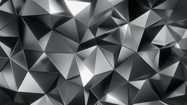 Close-up of a metallic silver geometric 3D low-poly surface texture